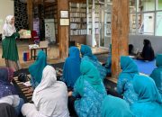 Dorong Kebiasaan Membaca dalam Keluarga Melalui Workshop Membaca Nyaring Bagi Kader PKK Desa